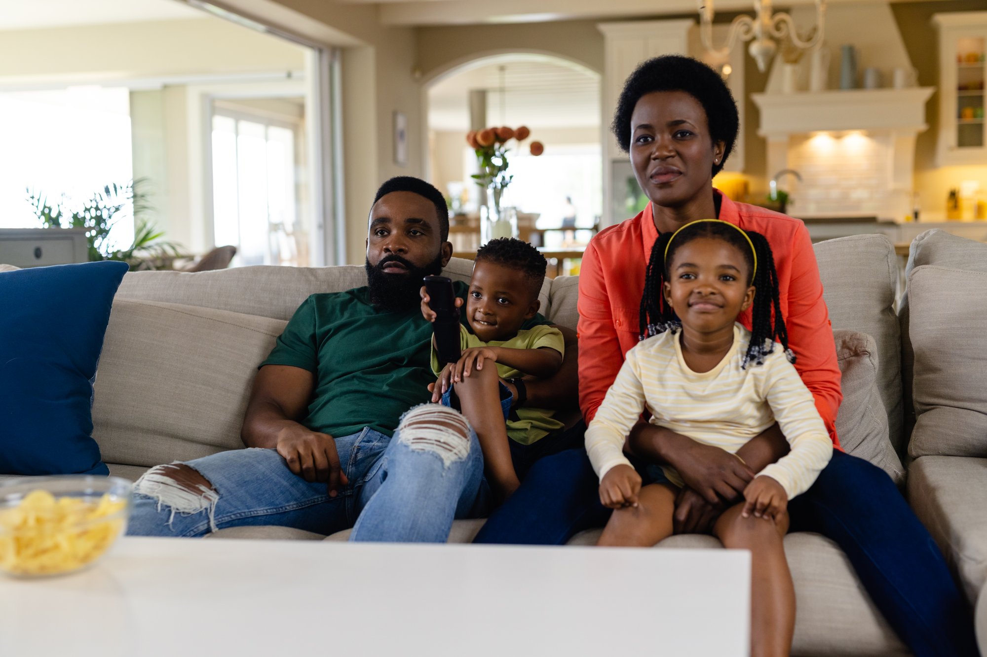 african-american-parents-and-children-watching-tv-2023-11-27-05-23-32-utc