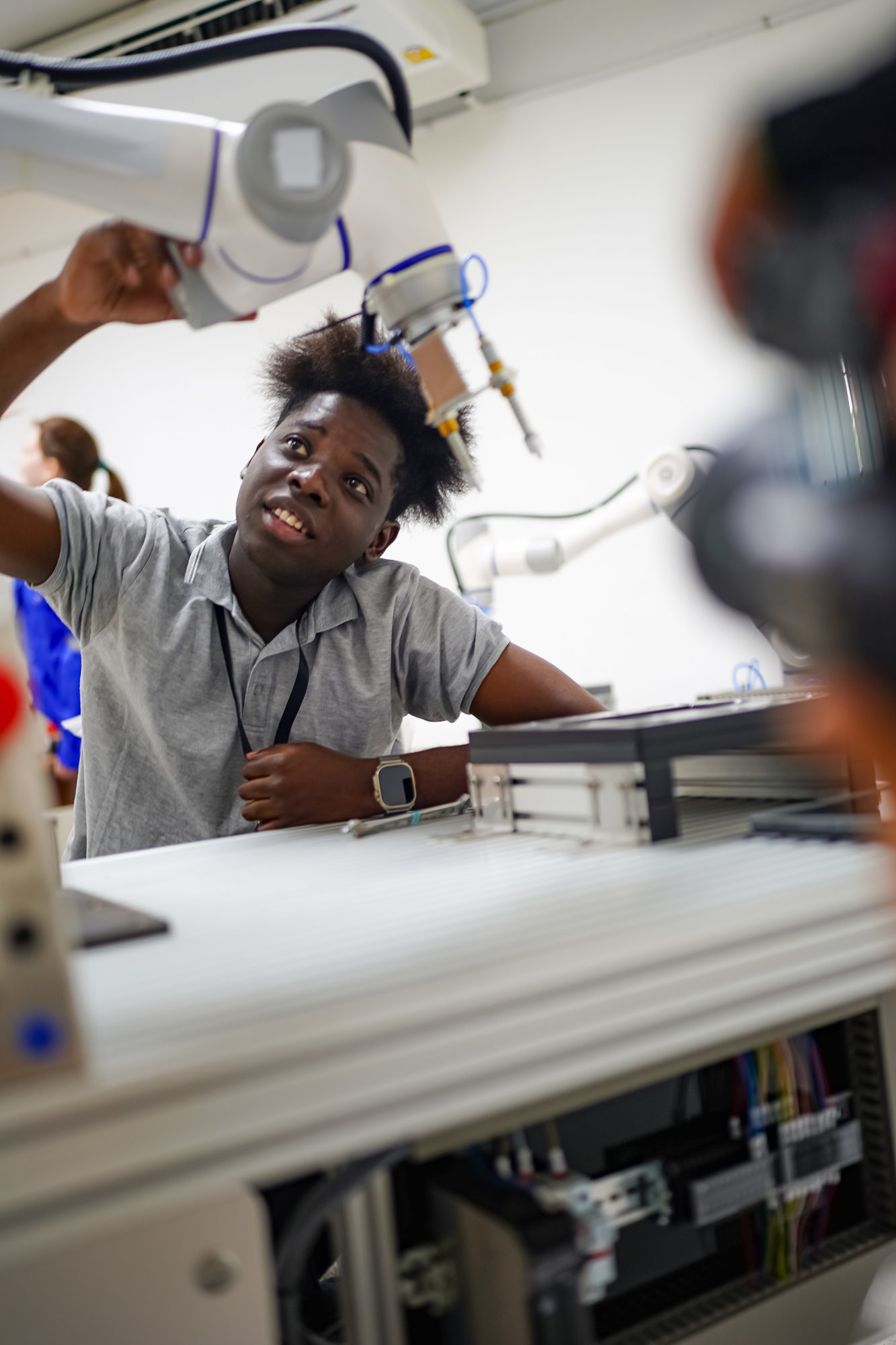 robotic-arm-engineer-check-on-equipment-in-its-wit-2024-03-04-21-50-58-utc